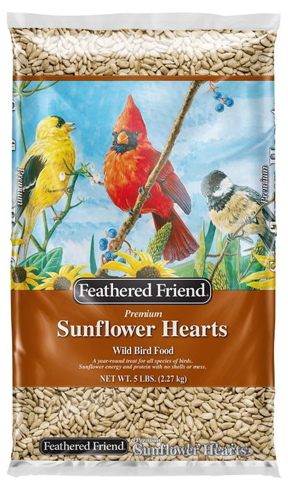 A bag of Feathered Friend Premium Sunflower Hearts Wild Bird Food featuring an illustration of birds and sunflower seeds.